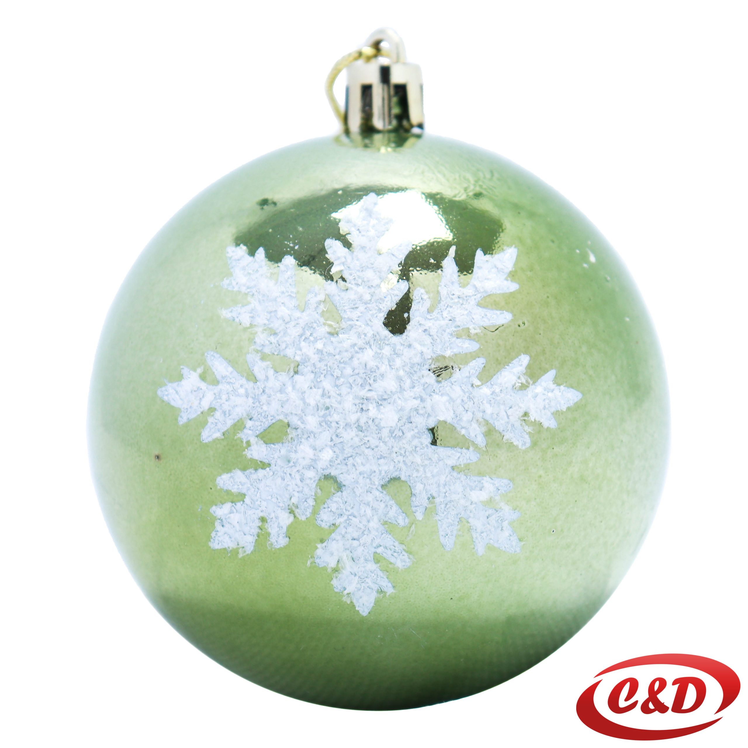 Zelena božićna kugla promjera 8 cm s bijelom pahuljom.