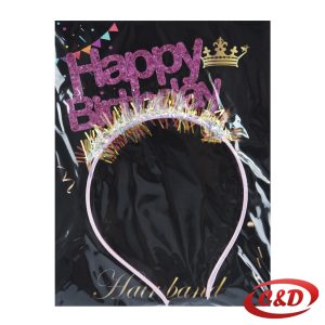 Rođendanski rajf s roza natpisom Happy Birthday i zlatnim resama.