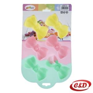 Silikonski kalup u obliku mašne u žutoj, roze i zelenoj boji dimenzija 9 × 5 × 3 cm