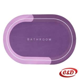 Ljubičasta prostirka za kupatilo 60x40 cm sa natpisom Bathroom