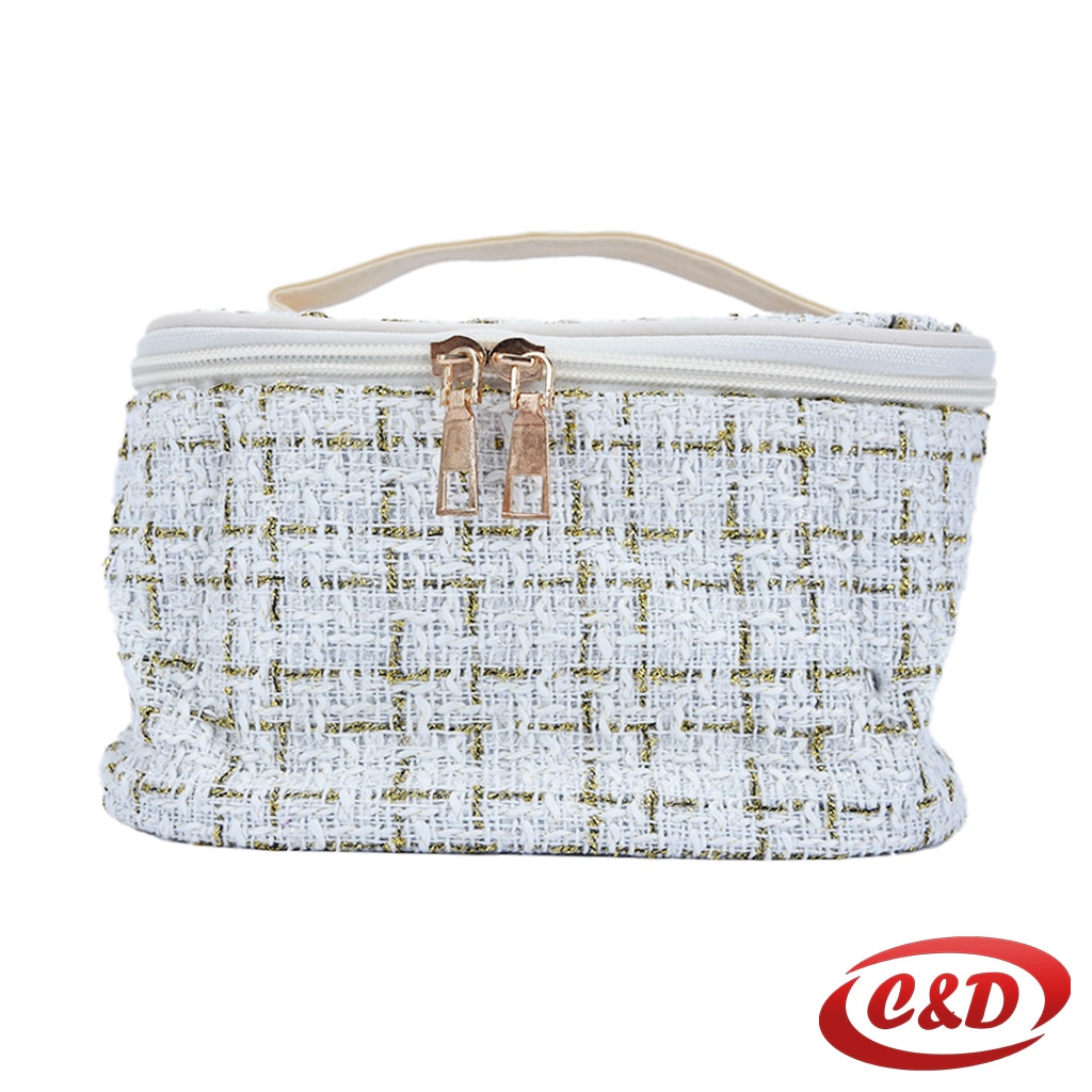 bijeli kozmetički neseser sa zlatnim detaljima i dva pretinca dimenzija 20 × 15 × 12 cm