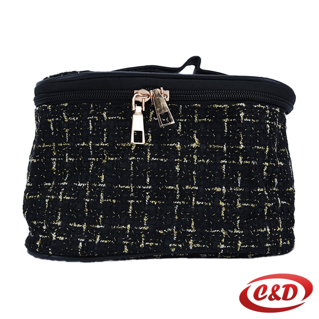 crni kozmetički neseser sa zlatnim detaljima i dva pretinca dimenzija 20 × 15 × 12 cm