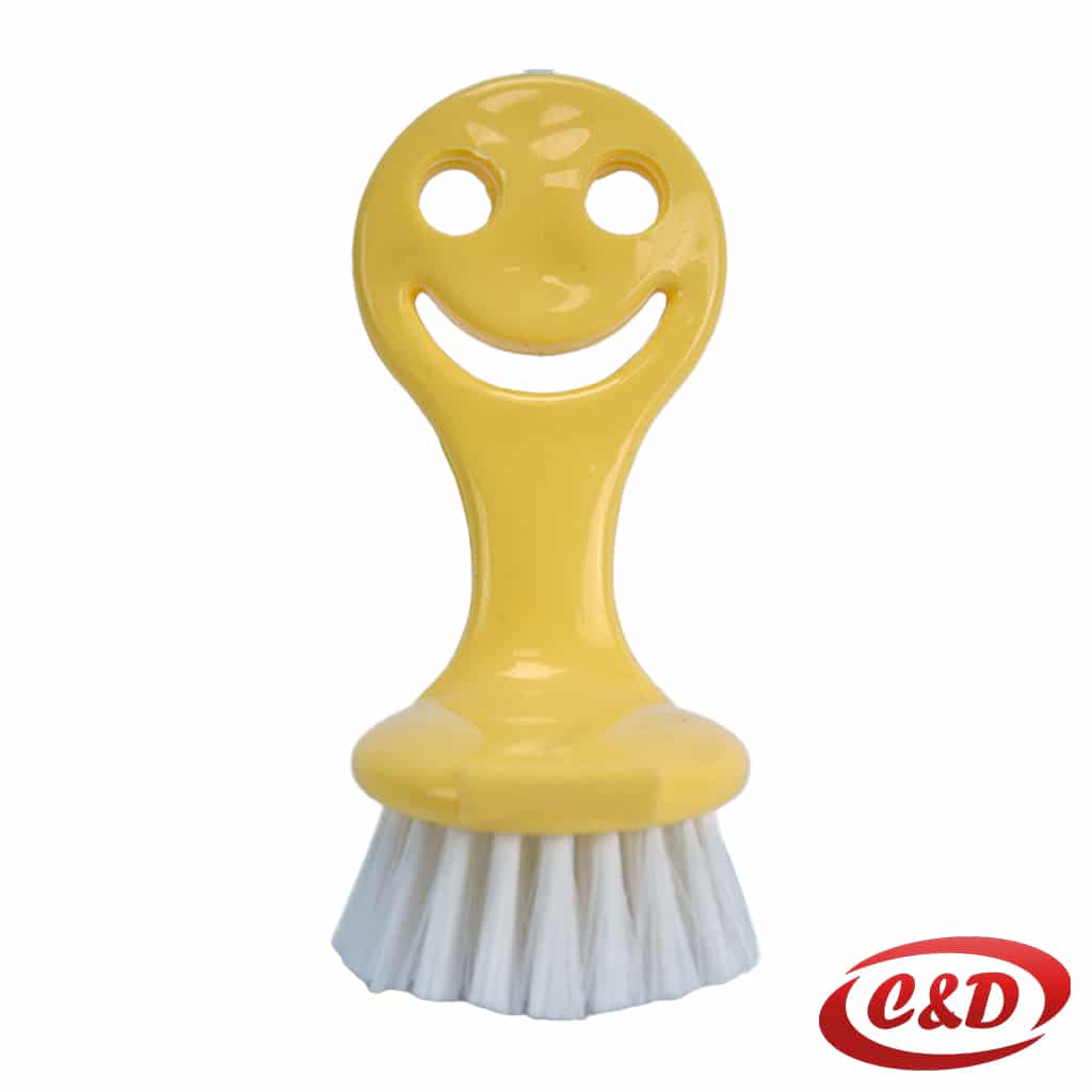 žuto-bijela četka za pranje posuđa okruglog oblika promjera 5 cm s drškom duljine 7 cm