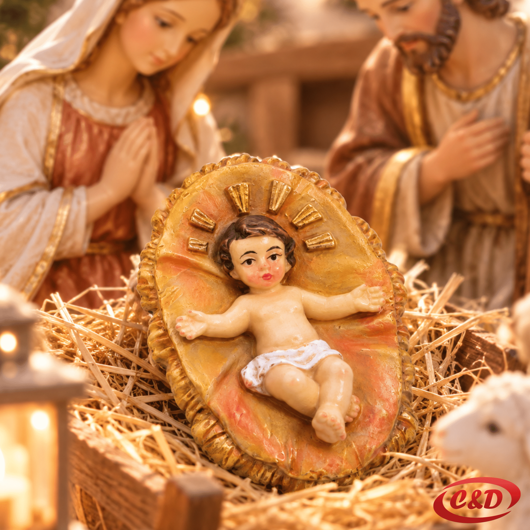 Keramička figura mali Isus za božićne jaslice dužine 6 cm i širine 4 cm u narančastoj i bež boji